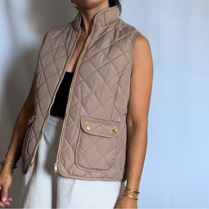 St John’s Bay quilted vest in camel color with gold hardware and pockets
